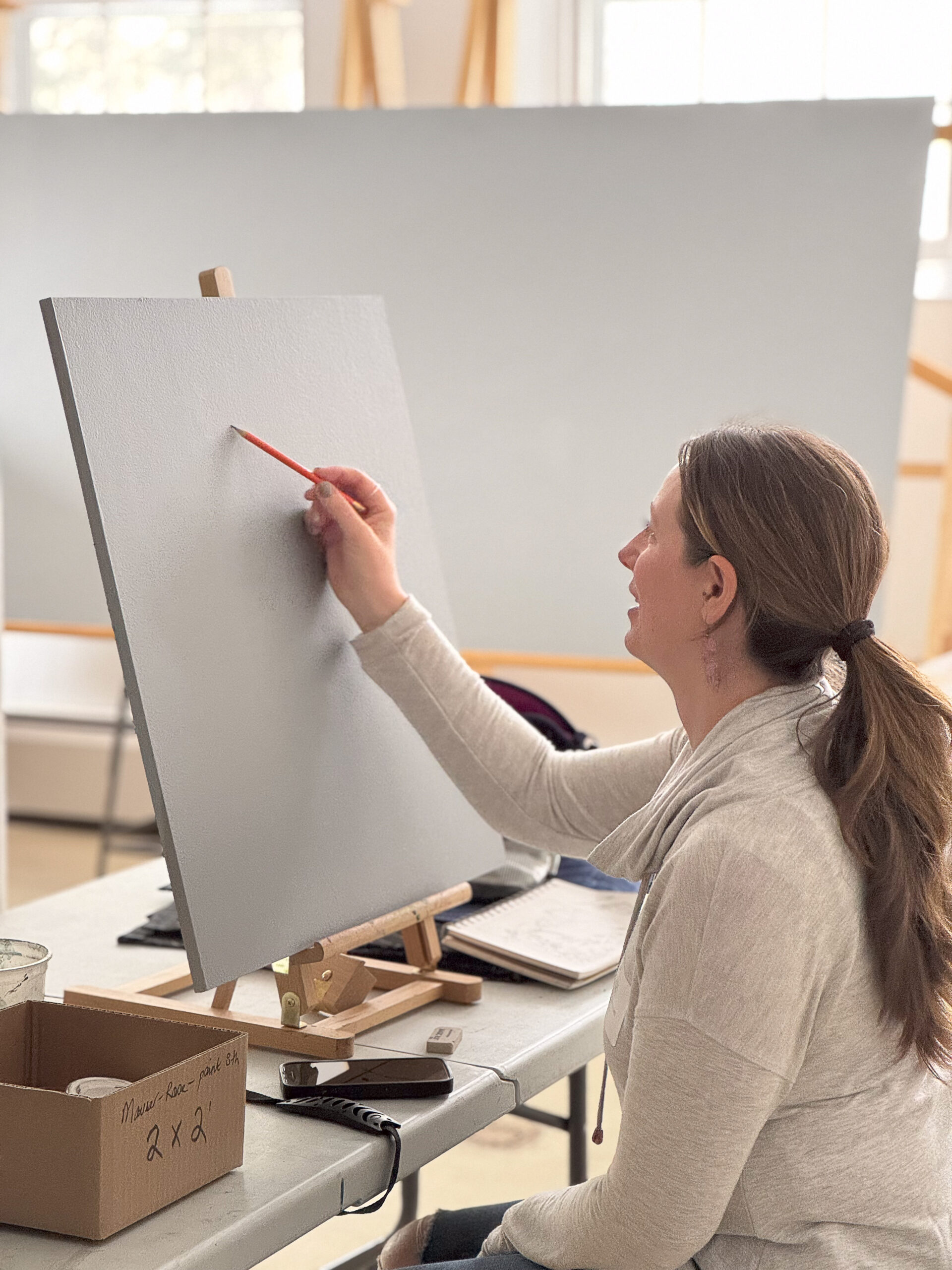 3 - Caitlin Mauser Rowe begins her 2x2 panel at the mural retreat. Mauser Rowe is a practicing artist and an elementary art teacher in the Kearsarge School District.